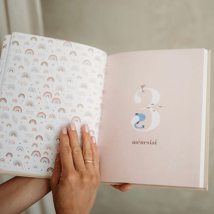 Light grey baby book "My first year"